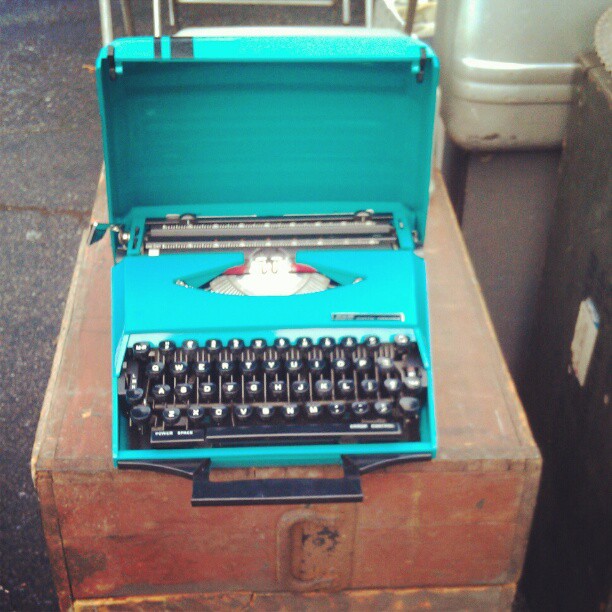 The 1970's teal case holds a gorgeous vintage typewriter! #MelroseTradingPost #fleamarket #antique #vintage #writer