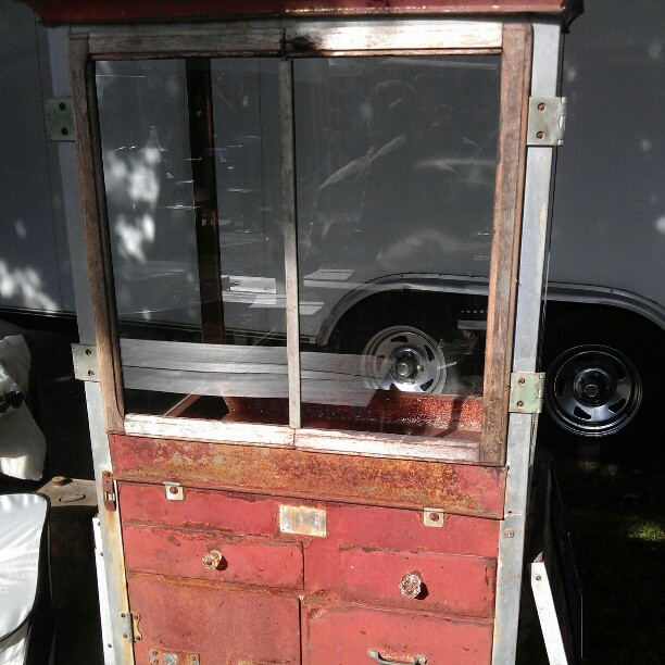 Before...1920' popcorn machine....now...glass cabinet...by Melrose Ticket booth G3