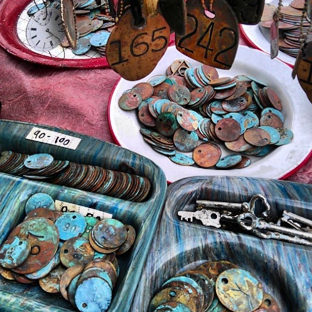 We love Beth's vintage door tag jewelry.  Each Tag has a story!