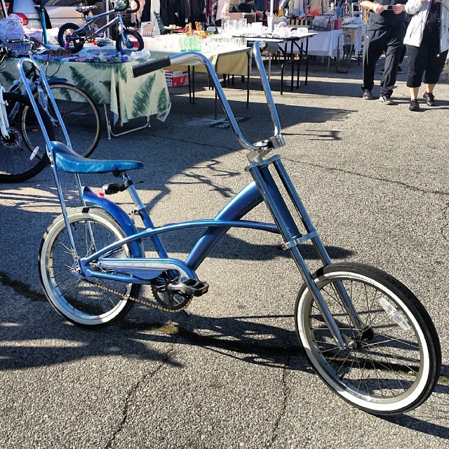 We are in love with this re-vamped sparkly blue Chopper bicycle!  Otis is in B99 with his latest repaired bikes and accessories (including glow in the dark tires)!