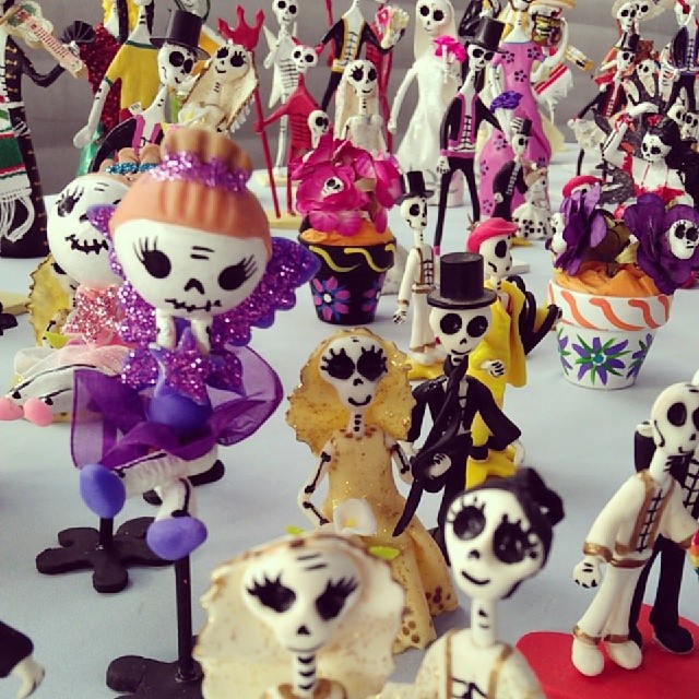 The vendor in M19 has these gorgeous handmade Day of the Dead figurines!