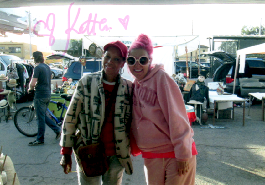 Kitten Kay Sera, the Pink Lady of West Hollywood, at the Melrose Trading Post with Ella Whitfield.